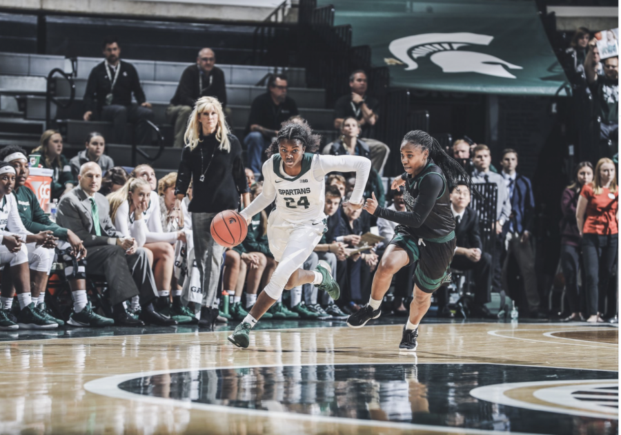 Nia Clouden sprints up the court against Eastern Michigan/ Photo Credit: MSU Athletic Communications 
