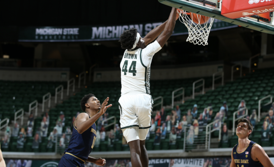 Gabe+Brown+skies+for+a+dunk+vs.+Notre+Dame%2F+Photo+credit%3A+MSU+Athletic+Communications