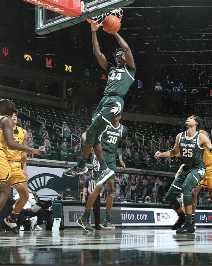 Gabe Brown skies for a baseline dunk/ Photo Credit: MSU Athletic Communications
