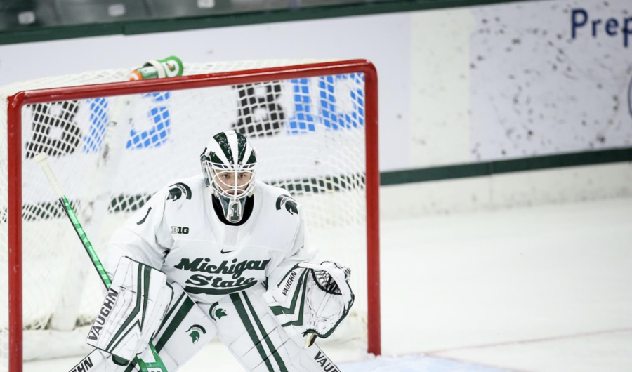 Spartan goaltender Drew DeRidder stands between the pipes during a game/ Photo Credit: MSU Athletic Communications