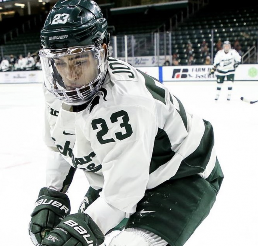 MSU+forward+Jagger+Joshua+chases+down+a+puck+in+the+corner%2F+Photo+Credit%3A+MSU+Athletic+Communications%0A%0A