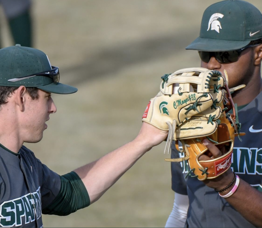 MSU outfielder Casey Mayes with teammate Zaid Walker/ Photo Credit: MSU Athletic Communications
