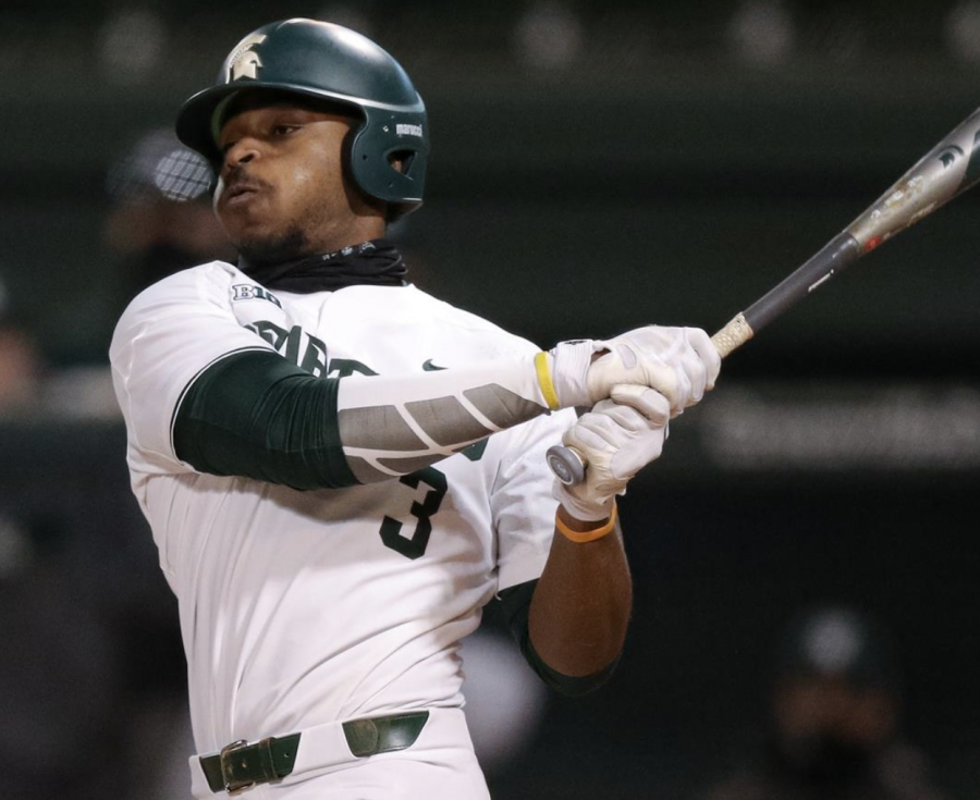 MSU outfielder Zaid Walker swings at a pitch during a game/ Photo Credit: Jeremy Fleming/MSU Athletic Communications 
