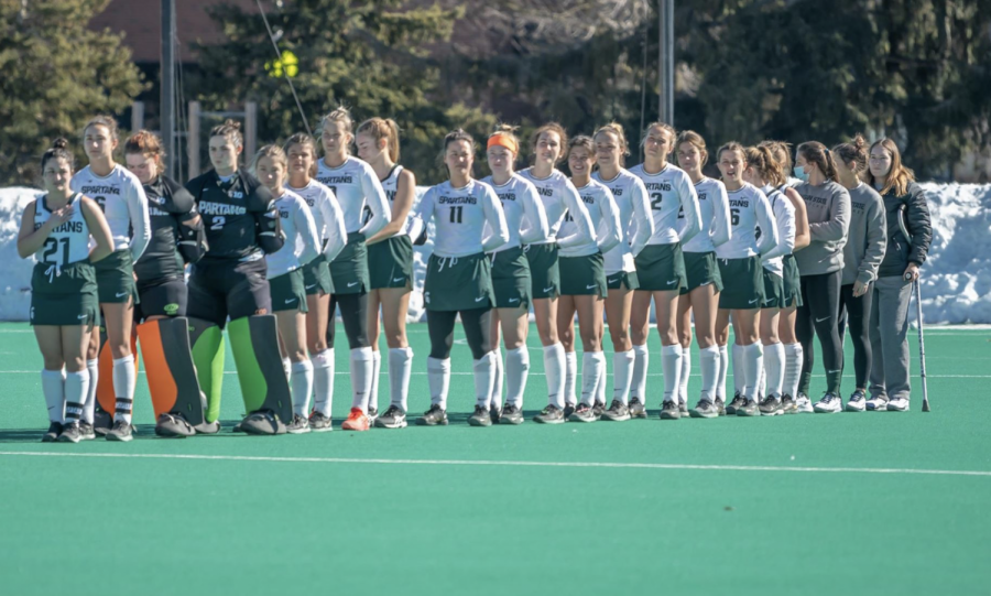 The MSU field hockey team stands during the national anthem/ Photo Credit: MSU Athletic Communications










