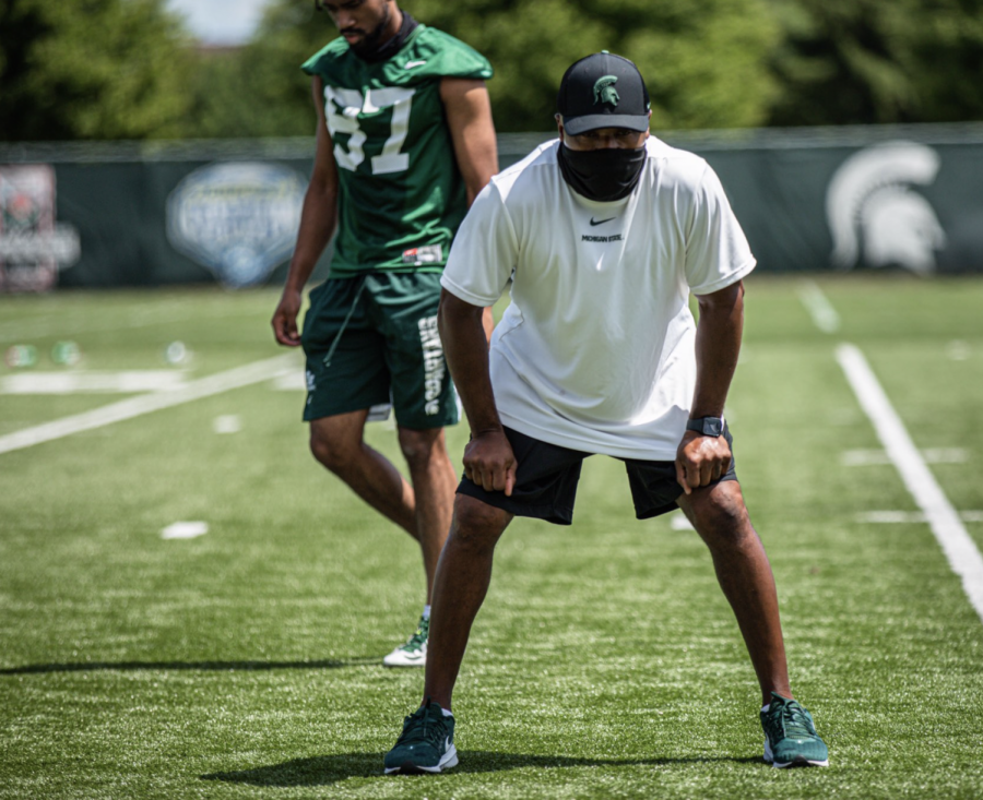 MSU+wide+receivers+coach+Courtney+Hawkins+supervises+a+group+of+wide+receivers+during+fall+practice+of+2020%2F+Photo+Credit%3A+MSU+Athletic+Communications+%0A%0A