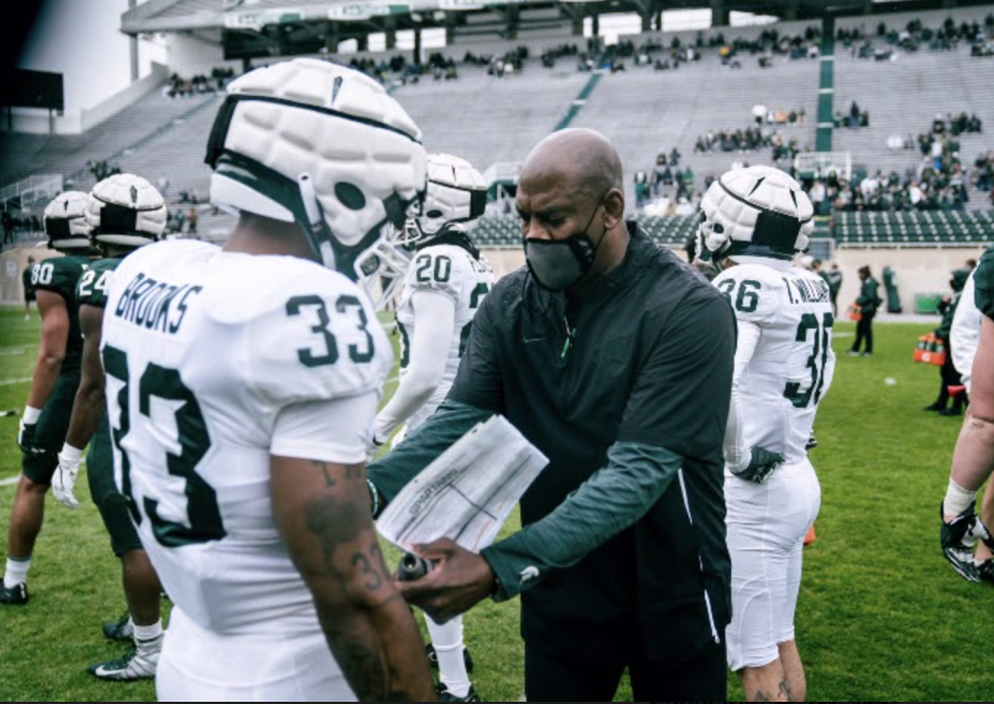MSU+head+coach+Mel+Tucker+talks+with+cornerback+Kendell+Brooks+during+the+2021+spring+game+on+April+24%2C+2021%2F+Photo+Credit%3A+MSU+Athletic+Communications+%0A%0A