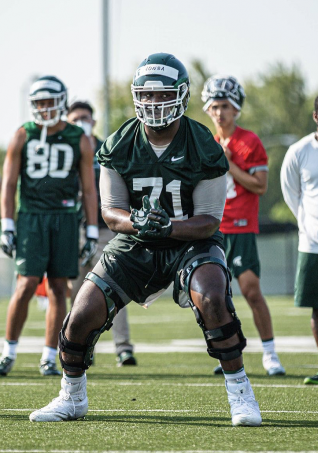 MSU offensive lineman James Ohonba practices his pass sets/ Photo Credit: MSU Athletic Communications 
