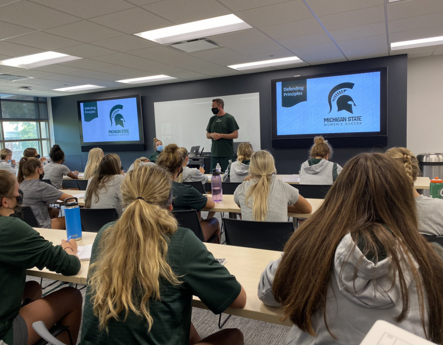 MSU head womens soccer coach Jeff Hosler meets with his team before the start of the 2021 season/ Photo Credit: MSU Athletic Communications 