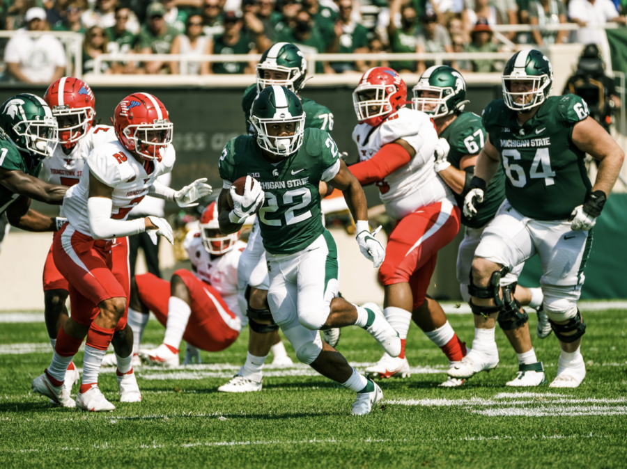 MSU running back Jordon Simmons hits the hole and runs for a big gain in the Spartans 42-14 home win over Youngstown State on Sept. 11, 2021/ Photo Credit: MSU Athletic Communications 