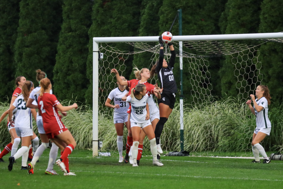 MSU goaltender Lauren Kozal makes a leaping save in the Spartans 1-0 loss vs. Wisconsin on Sept. 23, 2021/ Photo Credit: Sarah Smith/WDM