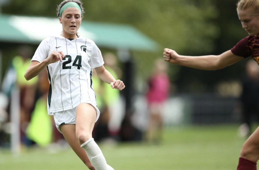 MSU forward/midfielder Ellie Rogers dribbles the ball during a game/ Photo Credit: MSU Athletic Communications 
