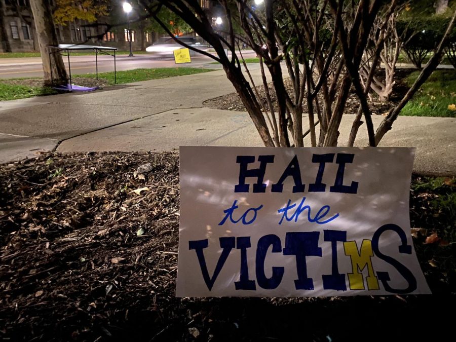 A sign reading Hail to the Victims sits outside University of Michigan President Mark Schlissels house in Ann Arbor, Michigan. Photo: Luke Sloan