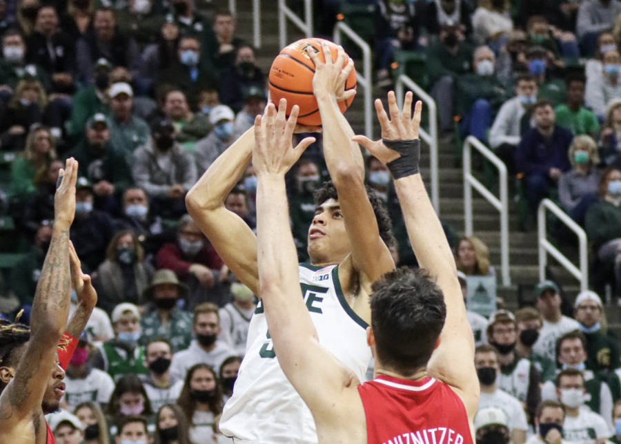 MSU forward Max Christie attempts a rising jumpshot during the Spartans 73-64 win over Louisville on Dec. 1, 2021/ Photo Credit: Sarah Smith/WDBM
