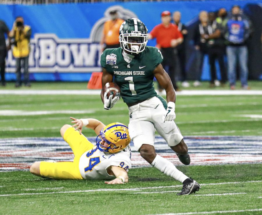 MSU+wide+receiver+Jayden+Reed+makes+a+man+miss+during+the+Spartans+31-21+win+over+No.+12+Pittsburgh+on+Dec.+30%2C+2021%2F+Photo+Credit%3A+MSU+Athletic+Communications