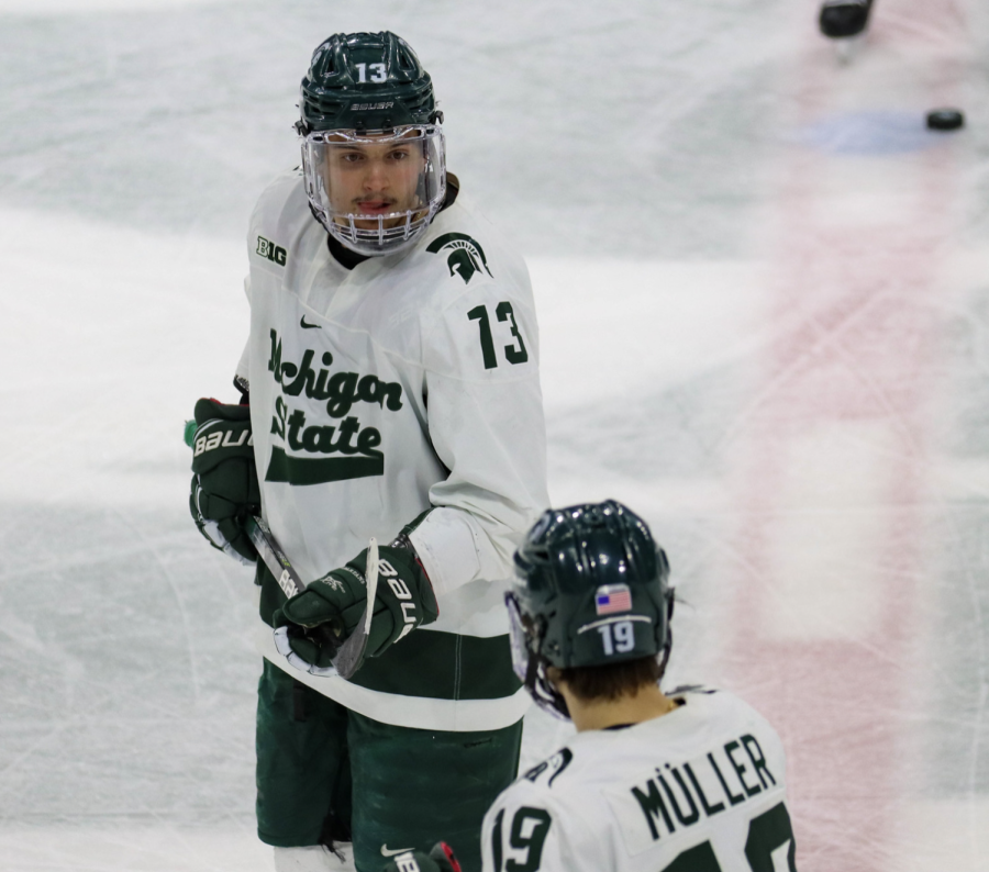 MSU forward Kristoff Papp talks with Nicolas Muller during the Spartas 4-1 loss to Ohio State on Jan. 21, 2022/ Photo Credit: Sarah Smith/WDBM