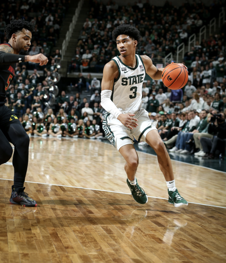 MSU guard Jaden Akins dribbles the ball during the Spartans 77-67 win over Maryland on March 7, 2022/ Photo Credit: MSU Athletic Communications 