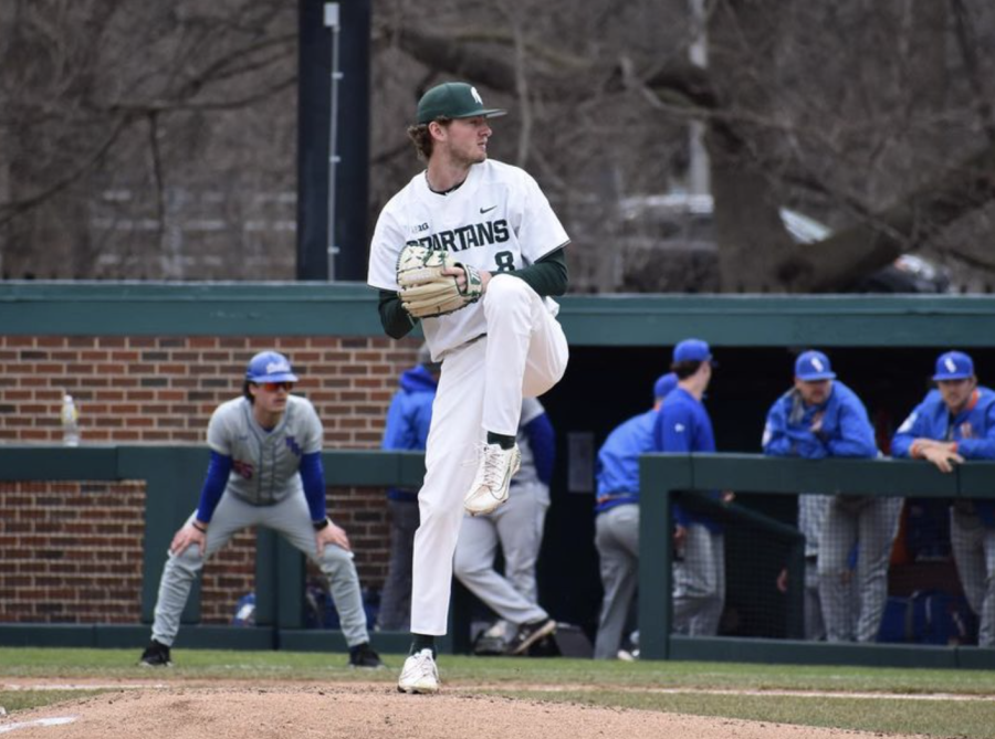 MSU pitcher Harrison Cook delivers a pitch during the Spartans 4-3 win over Houston Baptist on March 18, 2022/ Photo Credit: MSU Athletic Communications