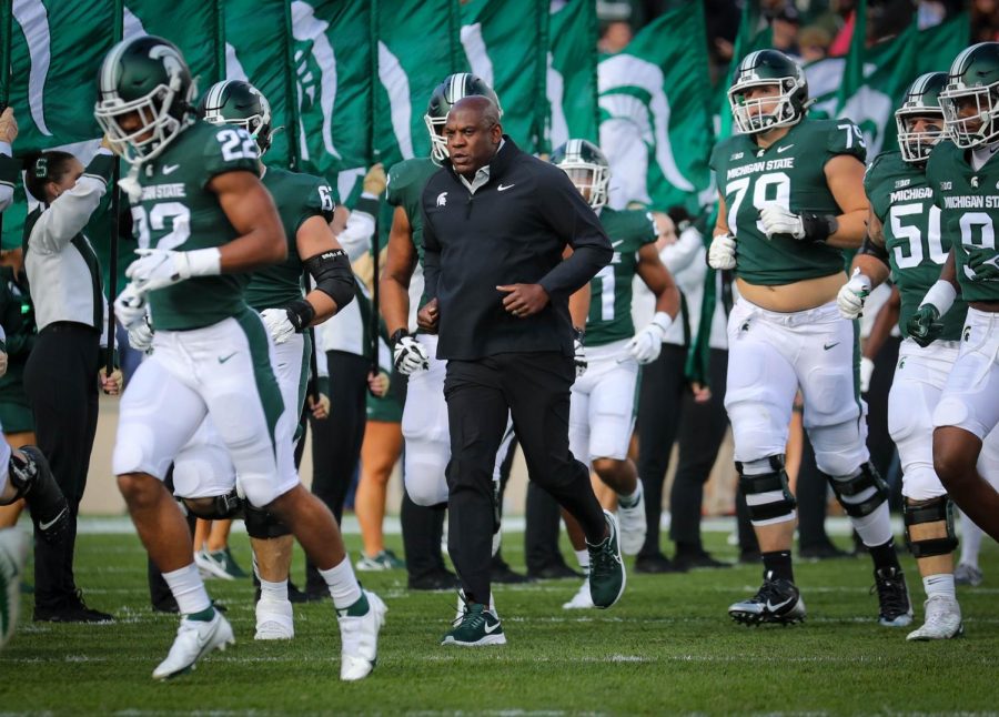 Head coach Mel Tucker runs onto the field prior to game against Ohio State on Oct. 8, 2022/ Photo Credit: Sarah Smith