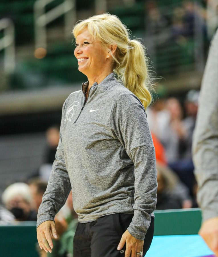 Head Coach Suzy Merchant smiles at her team during Michigan States 109-44 victory over Florida A&M on November 17, 2022. Photo Credit: Sarah Smith/WDBM
