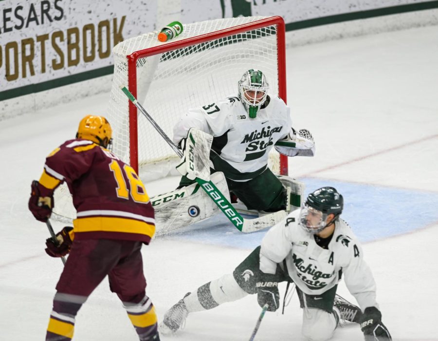 Dylan+St.+Cyr+defends+the+Spartans+goal+during+Michigan+States+loss+to+Minnesota+on+December+2%2C+2022.+Photo+Credit%3A+Jack+Moreland%2FWDBM