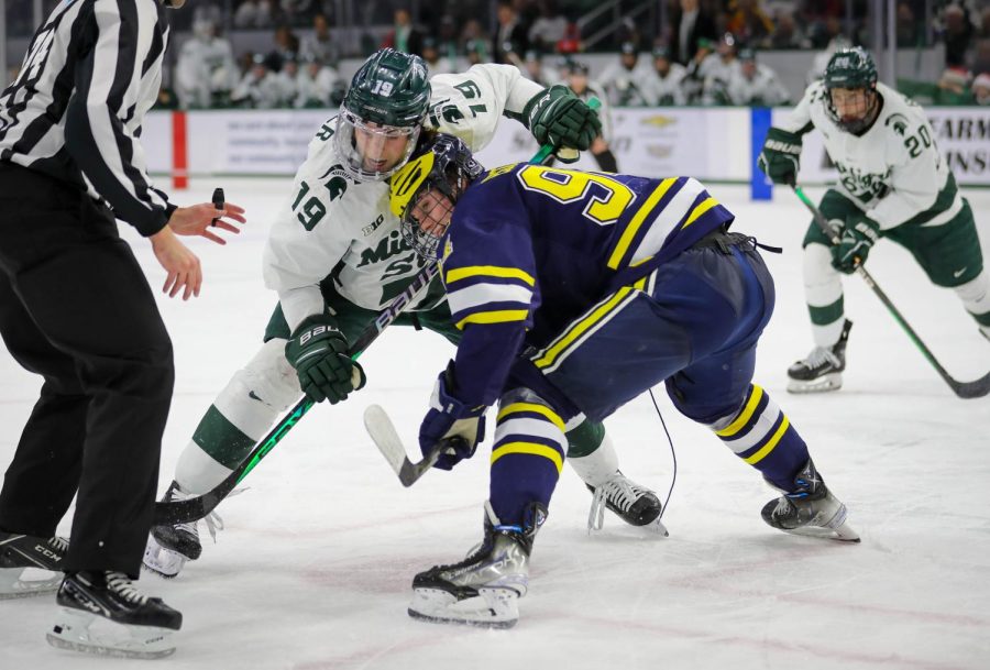 Nicolas Muller fights off a Michigan defender during Michigan States 2-1 victory over the Wolverines on December 9, 2022. Photo Credit: Sarah Smith/WDBM