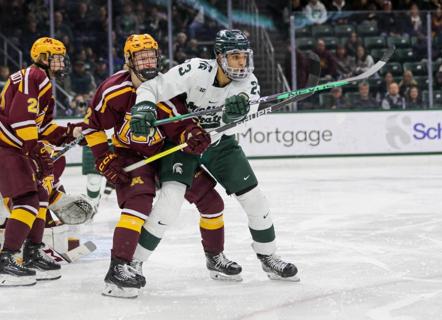 Jagger Joshua fights off a defender during Michigan States loss to Minnesota on December 3, 2022. Photo Credit: Sarah Smith/WDBM