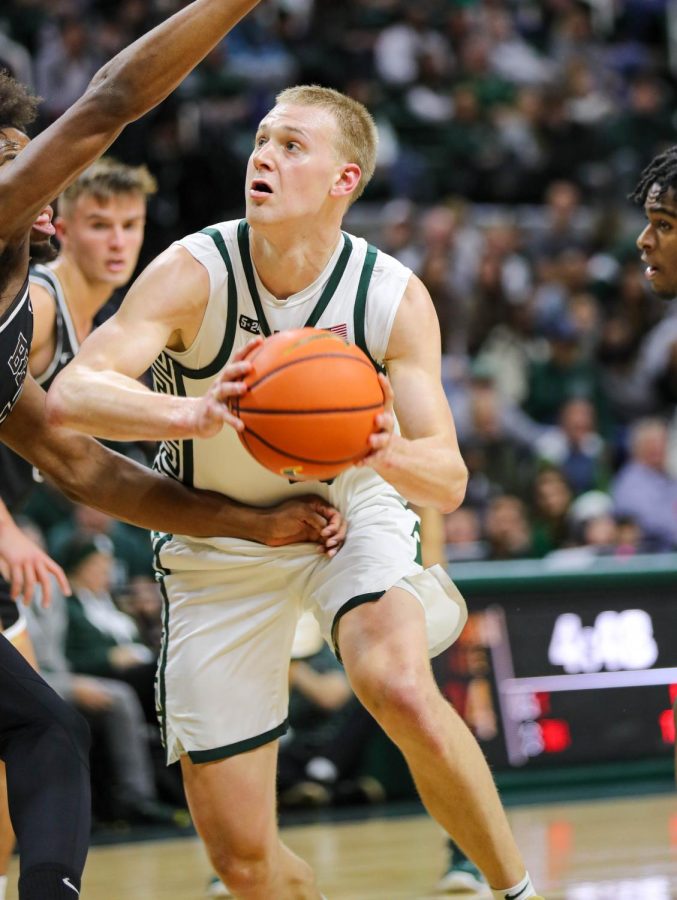 Joey Hauser looks to shoot the ball during Michigan States victory over Brown on December 10, 2022. Photo Credit: Sarah Smith/WDBM