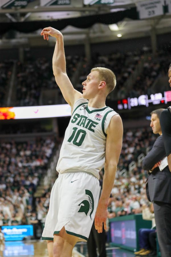 Joey Hauser shoots a three-pointer during Michigan States victory over Brown on December 10, 2022. Photo Credit: Sarah Smith/WDBM