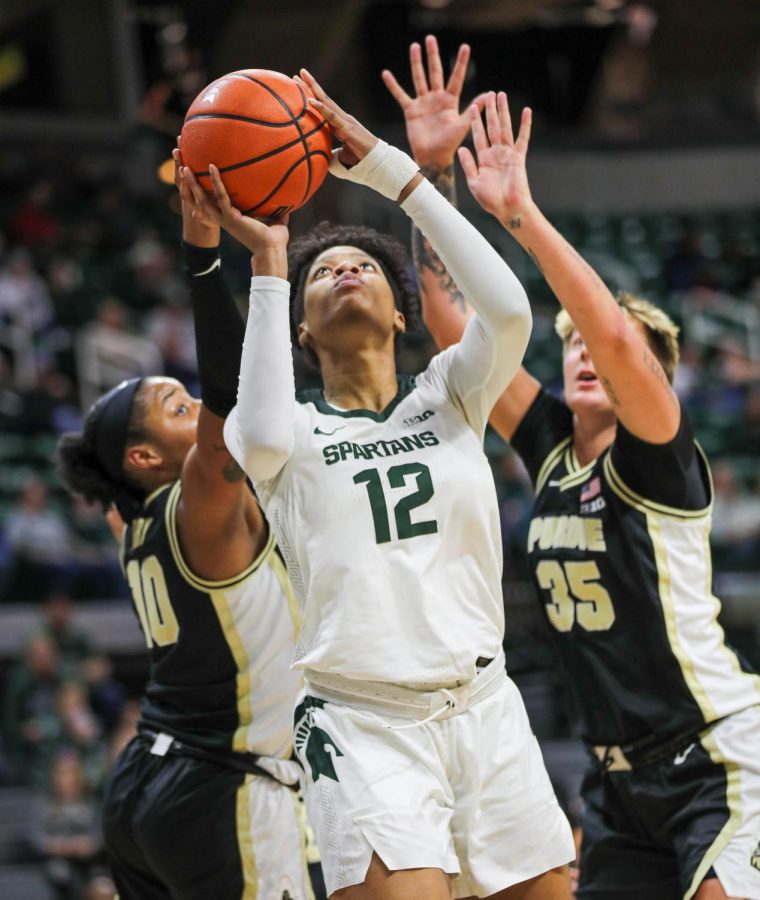 Isaline Alexander shoots the ball during Michigan States overtime loss to Purdue on December 5, 2022. Photo Credit: Sarah Smith/WDBM