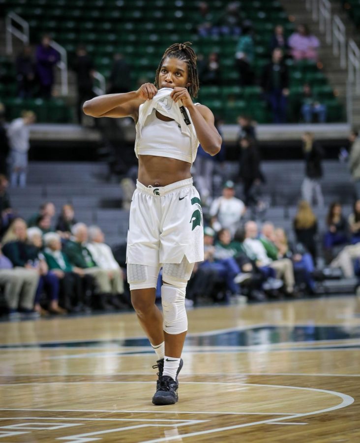 Kamaria McDaniel slowly walks off the court after Michigan States 84-80 loss to Wisconsin in overtime on January 11, 2023. Photo Credit: Sarah Smith/WDBM