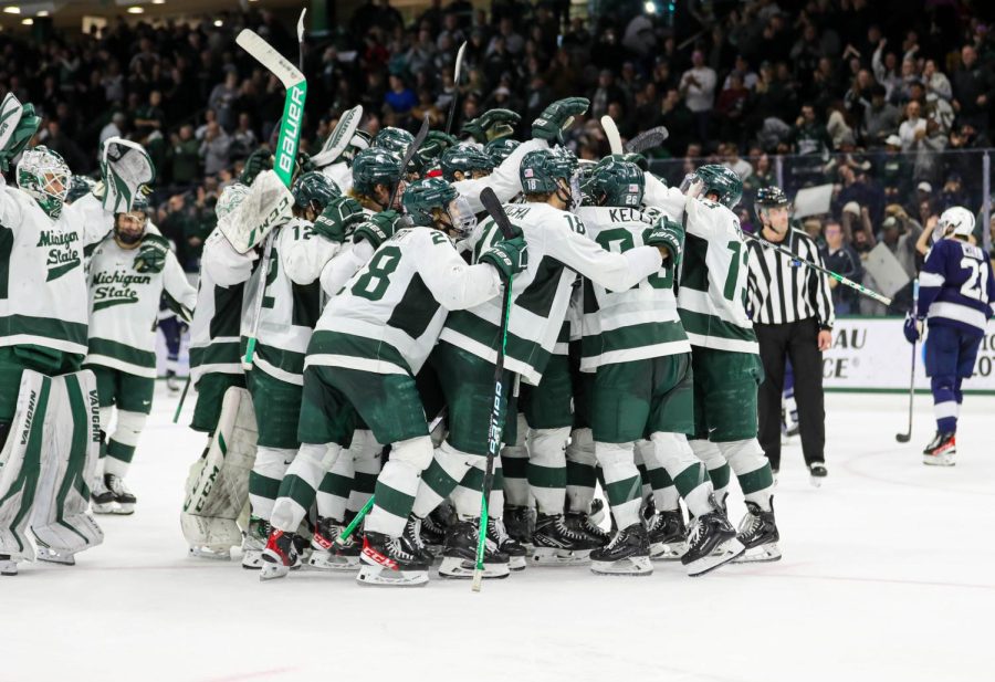 The Michigan State Spartans celebrate after their tie with No. 5 Penn State on January 14, 2023. Photo Credit: Sarah Smith/WDBM