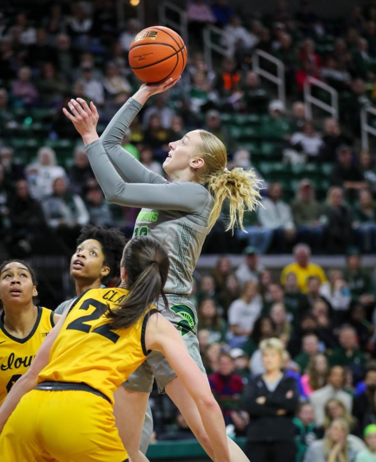 Stephanie Visscher shoots the ball during Michigan States 84-81 overtime loss to No. 10 Iowa on January 18, 2023. Photo Credit: Sarah Smith/WDBM