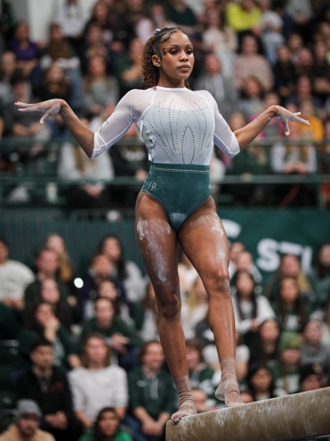 Nikki Smith on the beam during Michigan States 197.200-196.975 victory over No. 3 Michigan on January 22, 2023. Photo Credit: Sarah Smith/WDBM