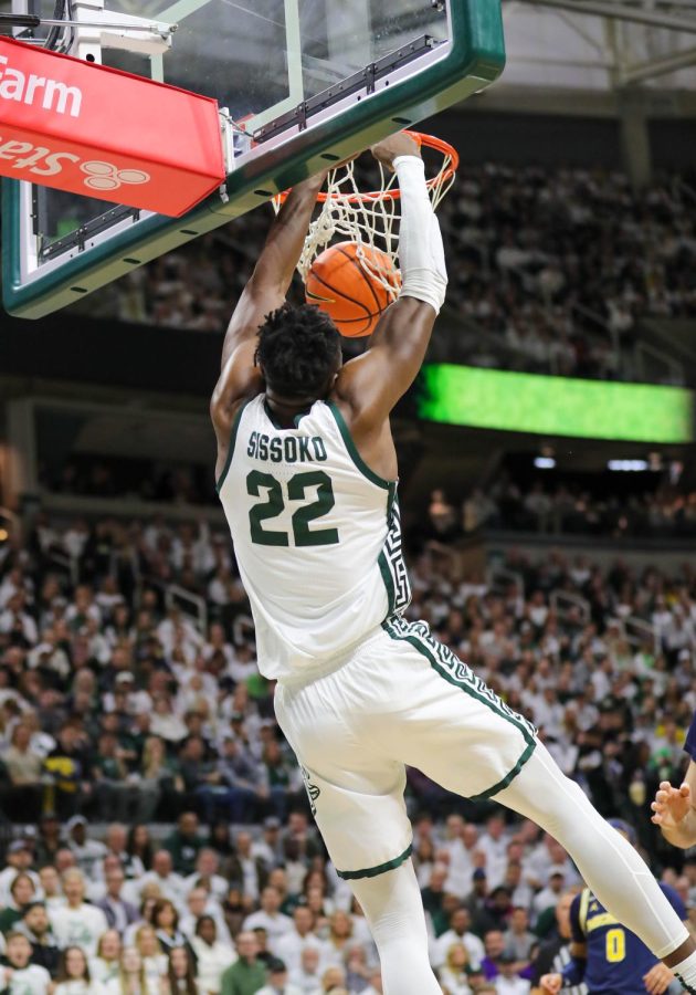 Mady Sissoko dunks the ball during Michigan States 59-53 victory over Michigan on January 7, 2023. Photo Credit: Sarah Smith/WDBM