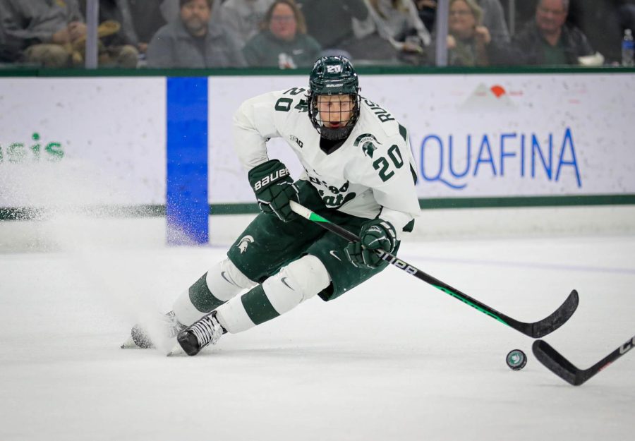 Danny Russell brings the puck up the ice during Michigan States 3-0 victory over No. 20 Notre Dame on February 3, 2023. Photo Credit: Sarah Smith