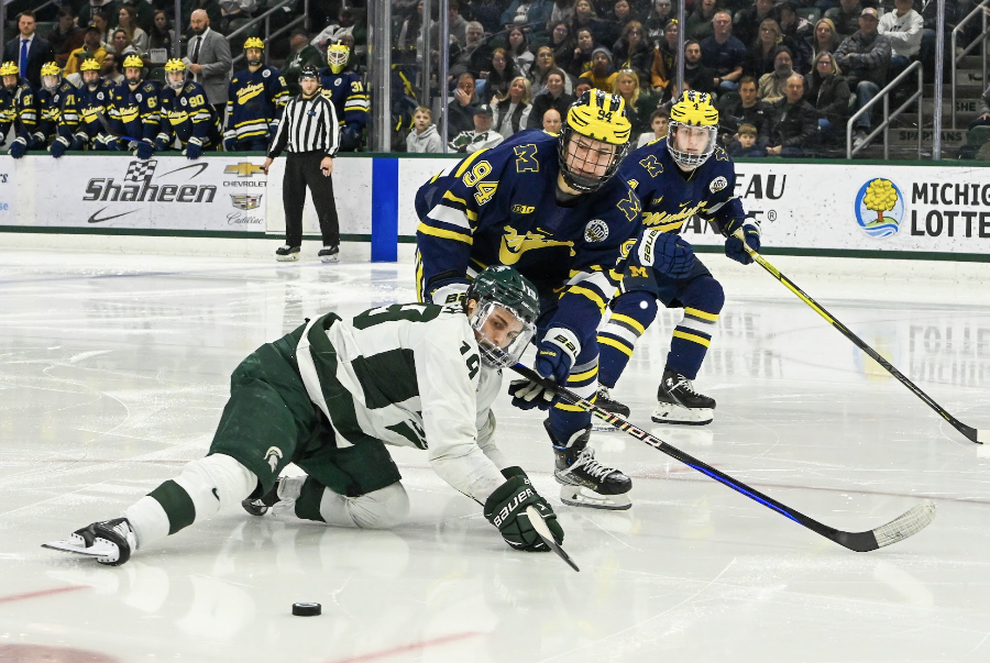 Nicolas Muller defends the puck from the Wolverines during Michigan State’s 4-2 loss to Michigan on February 10, 2023. Photo Credit: Jack Moreland/WDBM