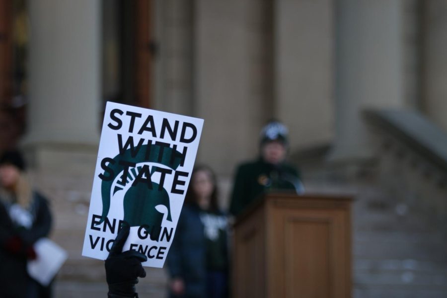 Stand with State sign during protest on Friday 2/17 Photo Credit: Jake Rhodes/WDBM
