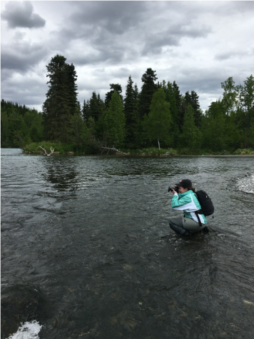 Leigh Anne Tiffany Taking a Picture in the Water