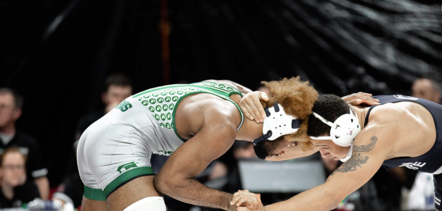 MSU wrestler Cameron Caffey spars with an opponent during an individual match/Photo Credit: Michigan State Athletic Communications 