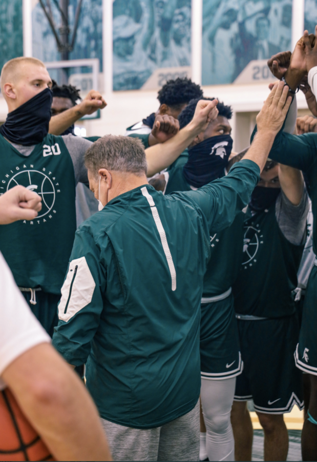 Tom Izzo leads his team in a post-practice huddle/ Photo Credit: MSU Athletic Communications