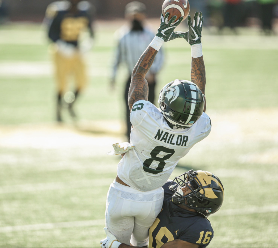 Jalen Nailor leaps for a grab against Michigan/ Photo Credit: MSU Athletic Communications
