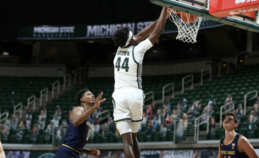 Gabe Brown skies for a dunk vs. Notre Dame/ Photo credit: MSU Athletic Communications