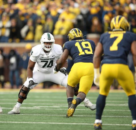 Michigan State offensive lineman Devontae Dobbs against Michigan defensive lineman Kwity Paye (Photo: MSU Athletic Communications)