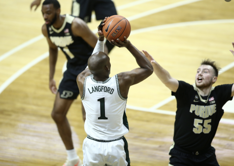 Joshua Langford attempts a 3-pointer over Purdue G Sasha Stevanovic/ Photo Credit: MSU Athletic Communications
