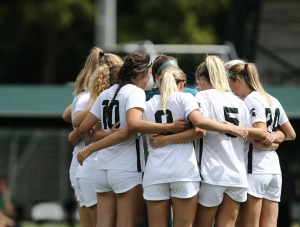 The MSU womens soccer team huddles together/ Photo Credit: MSU Athletic Communications

