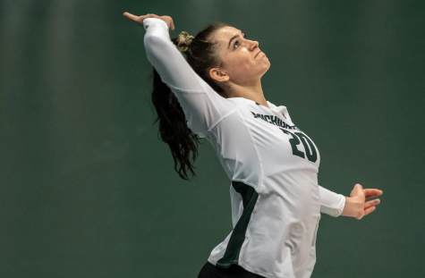 MSU outside hitter Cecile Max-Brown serves against No. 1 Wisconsin/ Photo Credit: MSU Athletic Communications