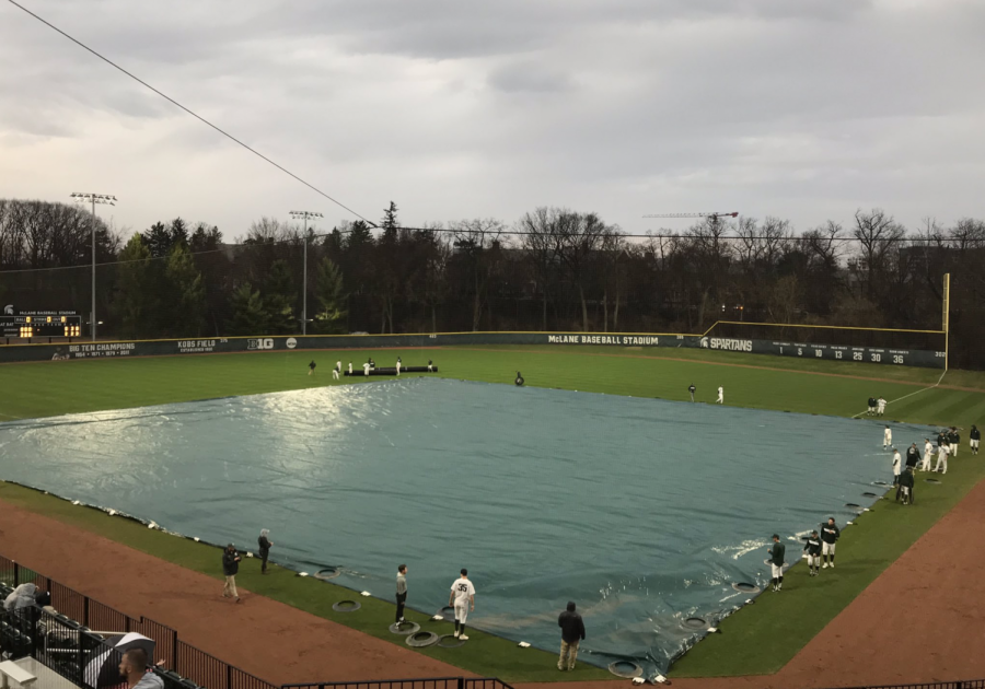 The field at McLane Baseball Stadium covered with a tarp/ Photo Credit: Luke Sloan/WDBM

