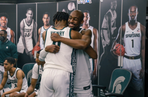 Joshua Langford hugs Aaron Henry after the Spartans knock off No. 2 Michigan 70-64/ Photo Credit: MSU Athletic Communications

