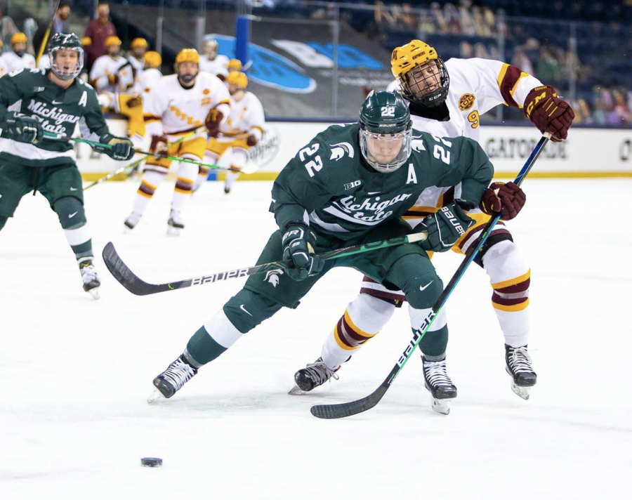MSU+defender+Dennis+Cesana+battles+for+the+puck+in+the+Spartans+2-1+season-ending+loss+to+No.+5+Minnesota+in+the+2021+Big+Ten+tournament%2F+Photo+Credit%3A+MSU+Athletic+Communications%0A%0A%0A%0A%0A