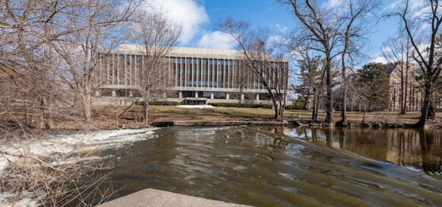 A view of the Hannah Administration building from the Red Cedar River/ Photo Credit: MSU University Communications 


